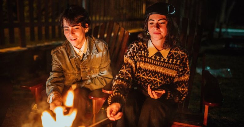 Heat Treating - Friends frying marshmallow on bonfire