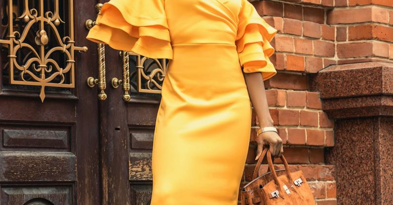 Metals - Woman Standing in Front of Door