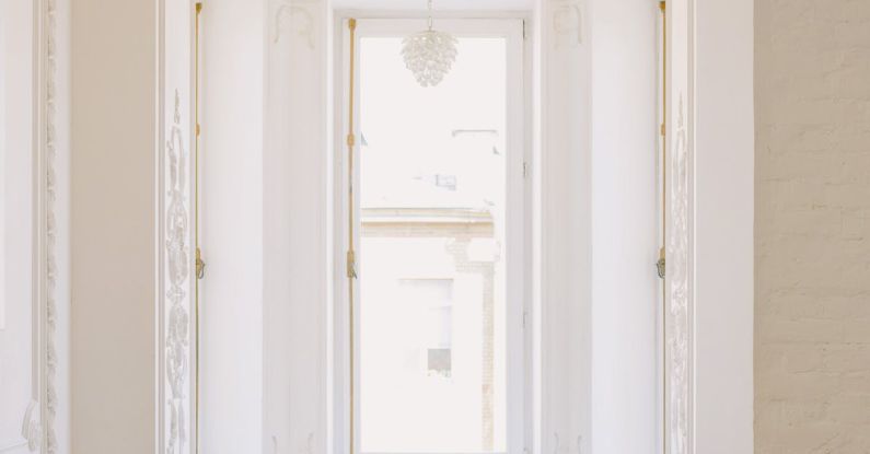 Intricate Designs - Chandelier near Window