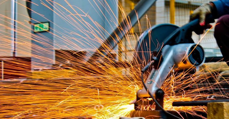 Steel - Cut-off Saw Cutting Metal With Sparks
