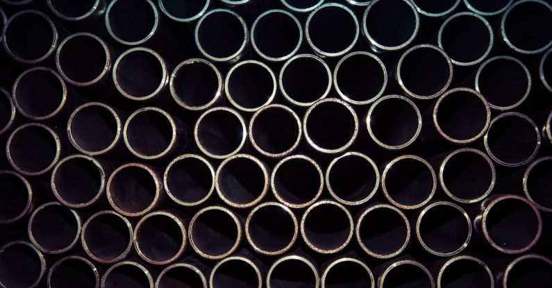 Stainless Steel - Close Up Photo of Gray Metal Pipes